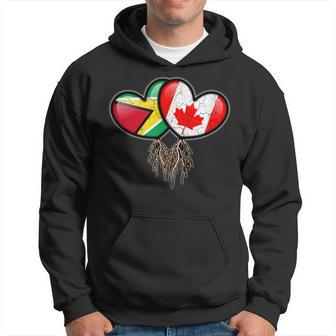 Guyanese Canadian Flags Inside Hearts With Roots Hoodie - Monsterry