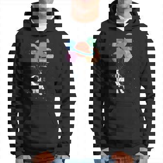 Happy Spaceman Keeps Planets Like Balloons In Space By Glow Hoodie - Monsterry