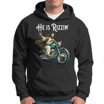 Rizzen Rizz He Is Rizzin Jesus Riding Motorcycle Hoodie - Seseable