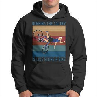 Running The Coutry Is Like Riding A Bike Joe Biden Vintage Hoodie | Mazezy DE