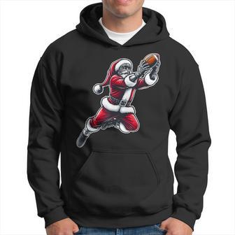 Santa Claus Playing American Football Christmas Football Fan Hoodie - Thegiftio UK