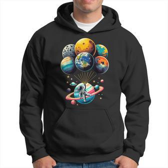 Solar System Astronaut Holding Planet Balloons Space Hoodie | Mazezy CA