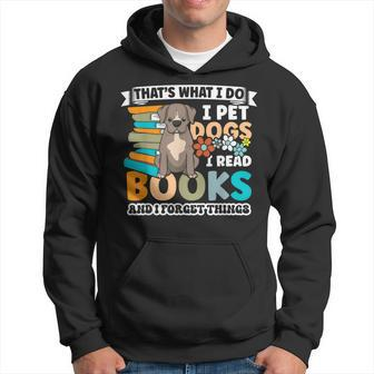 That's What I Do I Pet Dogs I Read Books And I Forget Things Hoodie | Mazezy