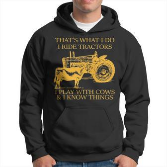 That's What I Do I Ride Tractors I Play With Cows And I Know Hoodie | Mazezy