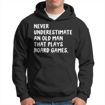 Never Underestimate An Old Man That Plays Board Games Hoodie - Monsterry DE