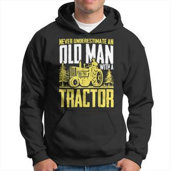 Never Underestimate An Old Man With A Tractor Farming Farm Hoodie | Mazezy CA