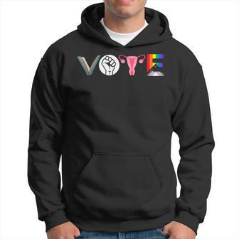 Vote Books Fist Ovaries Lgtbq Angry Uterus Hoodie - Seseable