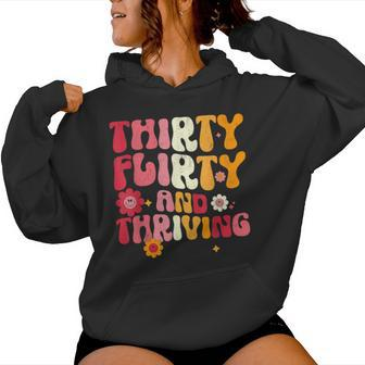 30 Thirty Flirty And Thriving 30Th Birthday Groovy Women Hoodie - Thegiftio UK
