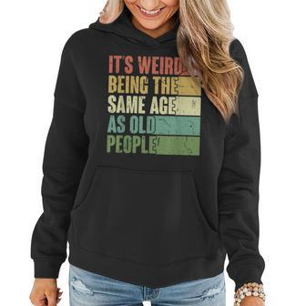 Its Weird Being The Same Age As Old People Retro Groovy 80'S Women Hoodie - Monsterry UK