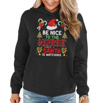 Be Nice To The Nurse Santa Is Watching Red Plaid Christmas Women Hoodie - Seseable