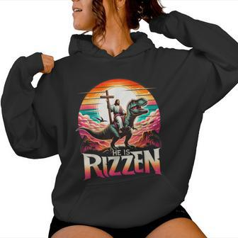 He Is Rizzen Jesus Has Rizzen Retro Christian Dinosaur Women Hoodie | Mazezy