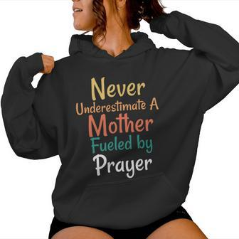 Never Underestimate A Mother Fueled By Prayer Praying Mama Women Hoodie - Seseable