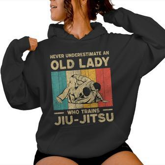 Never Underestimate An Old Lady Bjj Brazilian Jiu Jitsu Women Hoodie | Mazezy