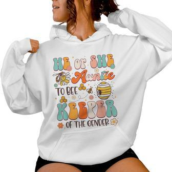 He Or She Auntie To Bee Keeper Of The Gender Reveal Groovy Women Hoodie | Mazezy UK