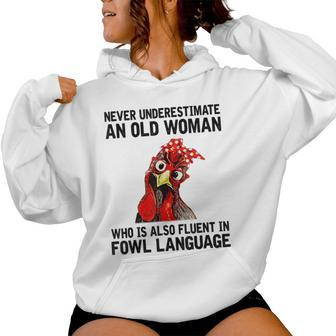 Never Underestimate An Old Woman Who Is Also Fluent Chickens Women Hoodie | Mazezy