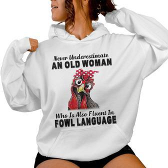 Never Underestimate An Old Woman Fluent In Fowl Language Women Hoodie - Monsterry