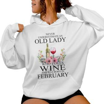 Never Underestimate An Old Woman Who Loves Wine February Women Hoodie - Thegiftio UK