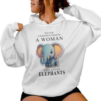 Never Underestimate A Woman Who Loves Elephants Women Hoodie - Monsterry