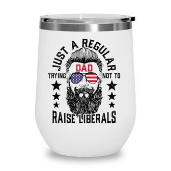 Just A Regular Dad Trying Not To Raise Liberals Wine Tumbler - Seseable