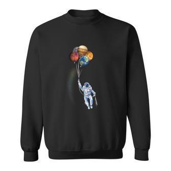 Astronaut Space Spaceman Holding Planet Balloon Sweatshirt - Monsterry
