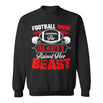 The Beauty Raised Her Beast Football Mom Sweatshirt - Monsterry CA