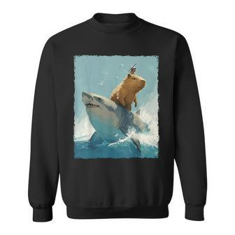 Capybara Is Riding A Shark Sweatshirt | Mazezy