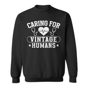 Caring For Vintage Humans Nurses Nursing Geriatric Nurse Sweatshirt | Mazezy