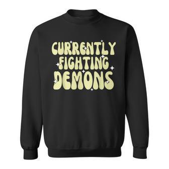 Currently Fighting Demons Apparel Sweatshirt - Monsterry AU