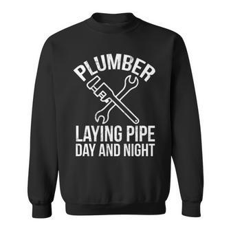 Plumbing Plumber Laying Pipe Day And Nigh Sweatshirt | Mazezy