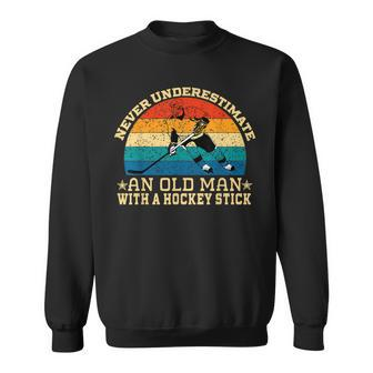 Never Underestimate An Old Man With A Hockey Stick Sweatshirt - Monsterry CA