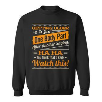 Getting Older Is Just One Body Part After Another Saying Sweatshirt - Monsterry UK