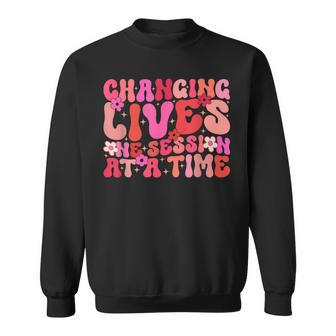 Groovy Changing Lives One Session At A Time Aba Therapist Sweatshirt | Mazezy