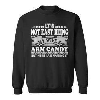 Its Not Easy Being My Wife's Arm Candy Fathers Day Dad Sweatshirt - Monsterry