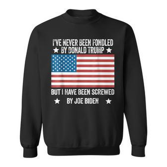 I’Ve Never Been Fondled By Donald Trump But Screwed By Biden Sweatshirt - Seseable