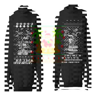 Mele Kalikimaka Hawaiian Christmas On The Beach Hawaii Santa Sweatshirt - Monsterry