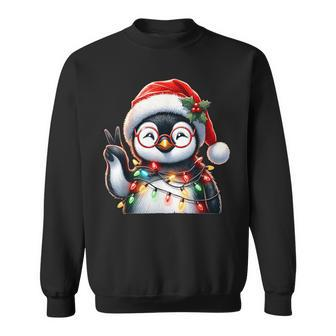Peace Sign Hand Penguin Santa Christmas Penguin Pajamas Sweatshirt - Monsterry CA