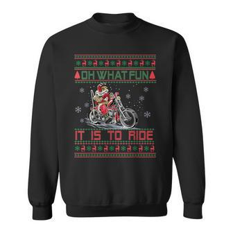 Santa Claus Riding Motorcycle Xmas Biker Present Christmas Sweatshirt - Monsterry AU