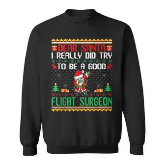 Santa Try To Be A Good Flight Surgeon Christmas Sweatshirt - Monsterry AU