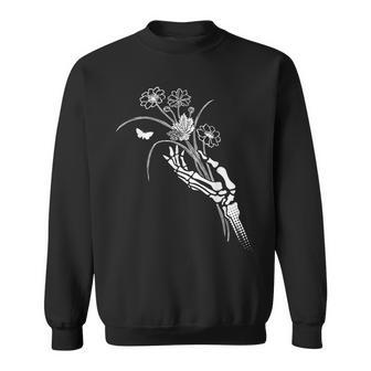 Skeleton Hand Holding Flowers Folkloric Wiccan Nature Witch Sweatshirt - Monsterry