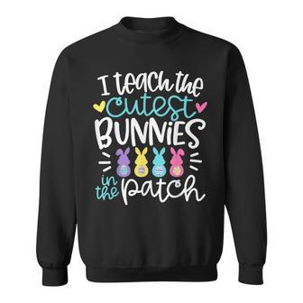 I Teach The Cutest Bunnies In The Patch Easter Eggs Teacher Sweatshirt | Mazezy DE