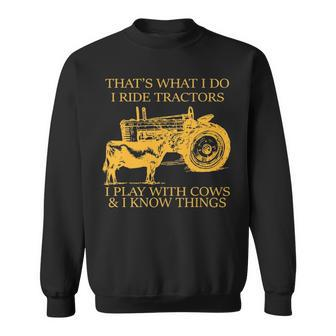 That's What I Do I Ride Tractors I Play With Cows And I Know Sweatshirt | Mazezy