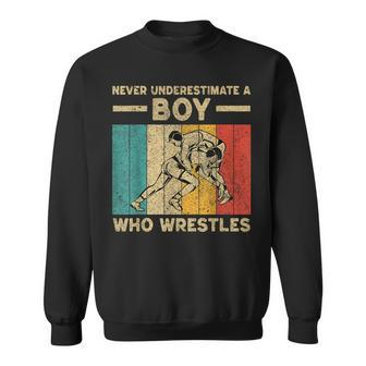 Never Underestimate A Boy Who Wrestles Vintage Wrestling Sweatshirt | Mazezy
