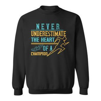 Never Underestimate The Heart Of A Champion Runner Sweatshirt | Mazezy