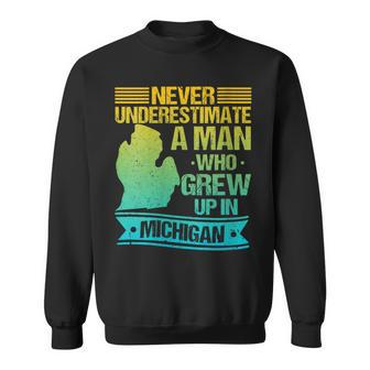 Never Underestimate A Man Who Grew Up In Michigan Sweatshirt - Thegiftio UK