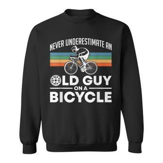Never Underestimate An Old Guy On A Bicycle Retro Vintage Sweatshirt - Monsterry AU