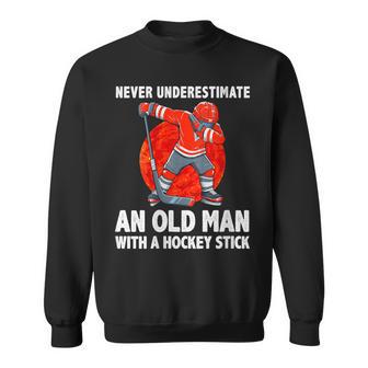 Never Underestimate An Old Man With A Hockey Stick Sweatshirt - Monsterry