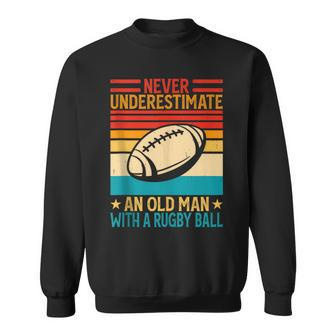 Never Underestimate An Old Man With A Rugby Ball Rugby Sweatshirt - Seseable