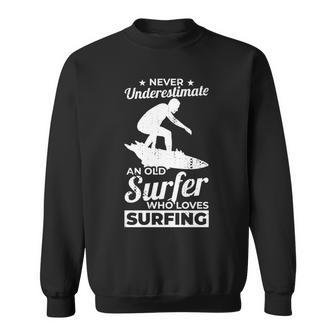 Never Underestimate An Old Surfer Surfing Grandpa Sweatshirt | Mazezy