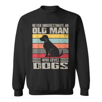 Vintage Never Underestimate An Old Man Who Loves Dogs Cute Sweatshirt - Thegiftio UK