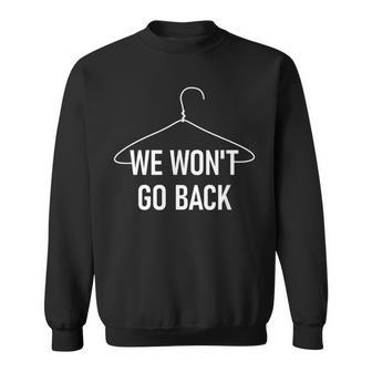 We Won't Go Back Hanger Pro-Choice Feminist Sayings Sweatshirt - Monsterry